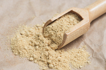 dried ginger ground in measuring spoon
