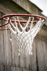 Fototapeta na wymiar Snowy basketball hoop