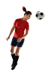 Foto op Plexiglas Young Woman HEading Soccer Ball © R. Gino Santa Maria
