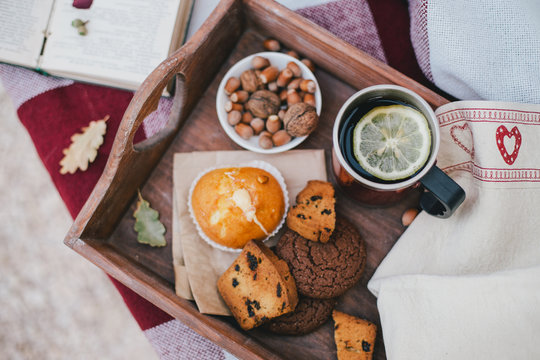 Cozy autumn picnic with tea and cookies