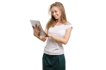 Beautiful young girl with tablet