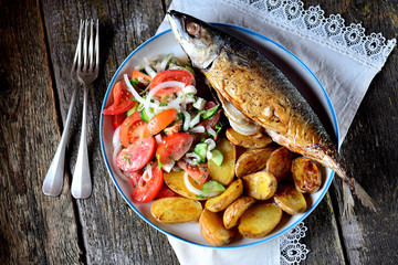 Mackerel baked with baby potatoes, rosemary, dill and parsley, sweet onions and spices. Served with a salad of fresh vegetables - tomatoes, cucumbers, sweet onions, dill, parsley and olive oil.