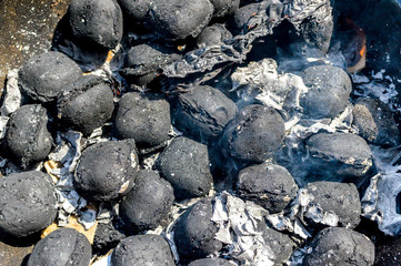 Close up charcoal BBQ blazing and glowing in Canada