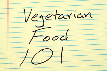 The words "Vegetarian Food 101" on a yellow legal pad