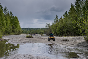 Dad and Son on ATV © Megan