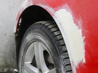 Car under repair in a car body shop