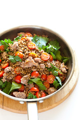 Fresh cooked meal with sausages, tomatoes and lentils