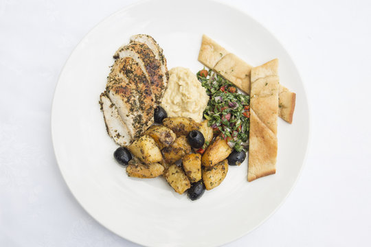 Greek inspired roasted chicken and potatoes