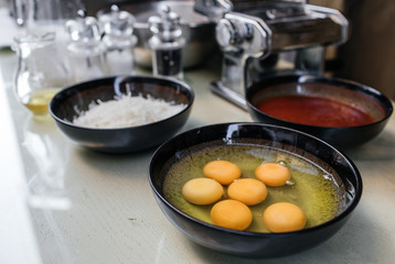 Fresh raw eggs in frying pan