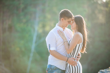 Young couple going to kiss outdoors