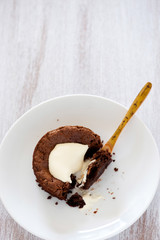 fresh baked choc cakes on wooden table