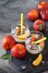 Summer diet cold drink: detox pure water with nectarine and ice