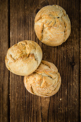 Wooden table with German Rolls, selective focus