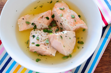 balanced meal with salmon, salad and lemon