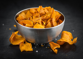 Portion of Sweet Potato Chips , selective focus