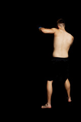 Fototapeta premium Teenager boxing in studio.