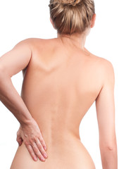 Fototapeta premium Woman from the back, backache, pain concept