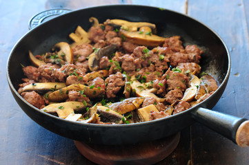 Fresh cooked meal with sausages, mushies