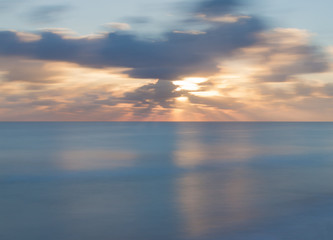 Naklejka na ściany i meble Long exposure early morning shot at the beach