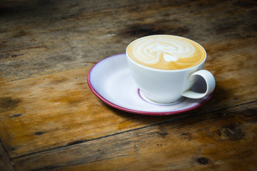 Top view of white coffee cup on wooden table for business and relaxing
