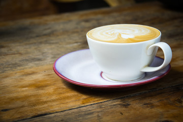 Top view of white coffee cup on wooden table for business and relaxing
