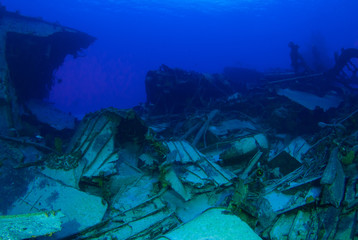 A shot of the sunken shipwreck of the captain keith tibbetts on little cayman. This old russian destroyer has been sunk to make an artificial reef for marine life in the ocean and for scuba divers 