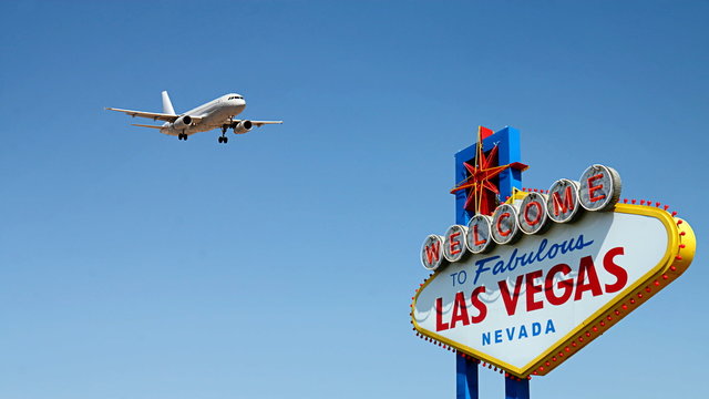 Fototapeta Welcome to Fabulous Las Vegas Sign with Arriving Airplane