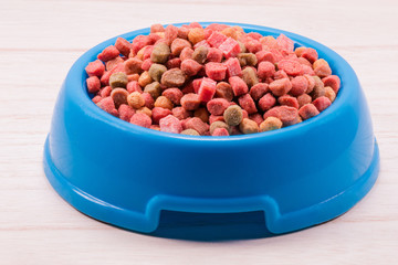 Dog snack ,dog chews, dog biscuits on a white wooden table wall background