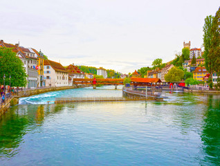 Fototapeta na wymiar Chapel Bridge and Water Tower in Luzern - Switzerland