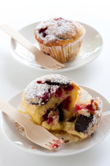 Homemade muffins with raspberries and dark chocolate