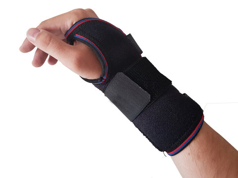 Black wrist splint for right hand male model. isolated white background