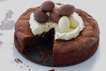 Homemade chocolate cake with chocolate eggs
