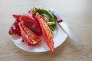 Green and red bell pepper backgro. Include fresh organic vegetables and pepper on wooden floor