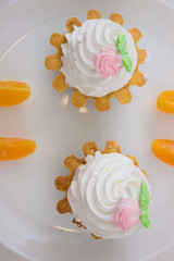 cake basket with cream on a plate