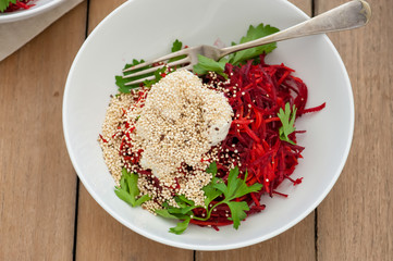 crunchy beet salad served in a bowl, top view