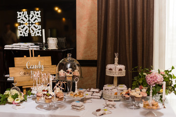 Delicious wedding reception candy bar dessert table