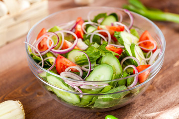 vegetable salad bowl on kitchen table, balanced diet