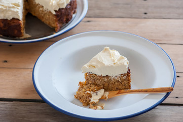 Homemade cake with carrot, cheese and cream