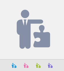 Businessman Holding Puzzle Piece - Granite Icons. A professional, pixel-perfect icon designed on a 32x32 pixel grid and redesigned on a 16x16 pixel grid for very small sizes