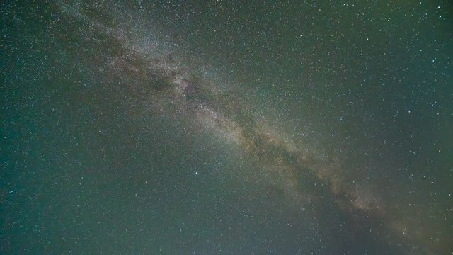 The milky way time lapse with asteroids skyfall in august. no clouds