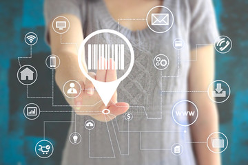 Business woman presses button barcode product in network internet computer interface