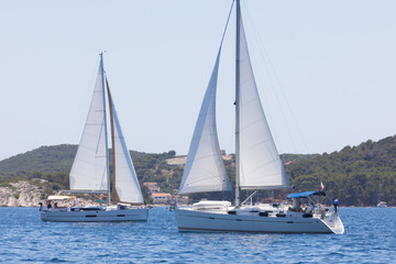 Fototapeta na wymiar meeting yachts near seaside, croatia