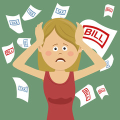 Young desperate woman with bills and tax while shouting out