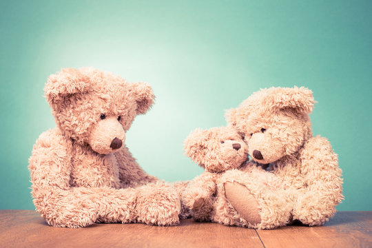 Teddy Bear's toy family concept. Retro old style filtered photo