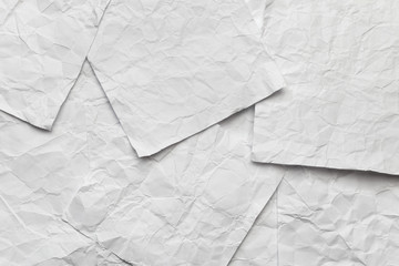 Background of white notes crumpled