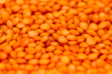 Red lentils as background. macro