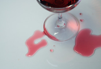 glass with red wine splash
