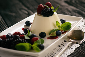 Italian dessert - panna cotta with berries.