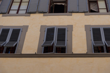 Fototapeta na wymiar Details of the exterior of Italian buildings in Florence, Tuscany, Italy.