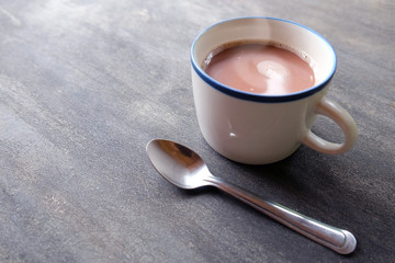 Obraz na płótnie Canvas A cup of hot drink